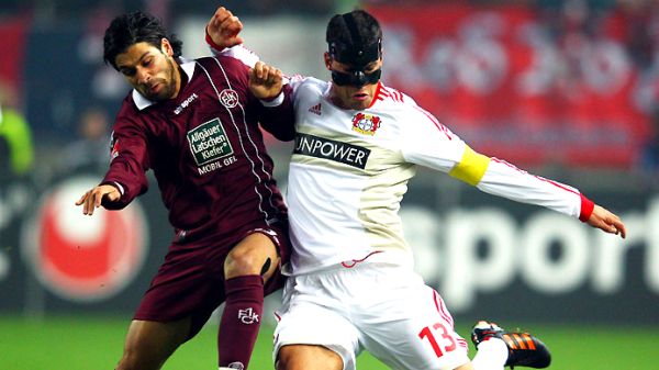 Olcay Sahan i Michael Ballack; foto: Bundesliga.de Olcay Sahan i Michael Ballack; foto: Bundesliga.de